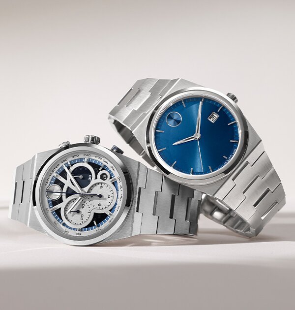 BOLD Quest watch with stainless steel bracelet with blue skeleton dial underneath a BOLD Quest watch with stainless steel bracelet and blue dial.