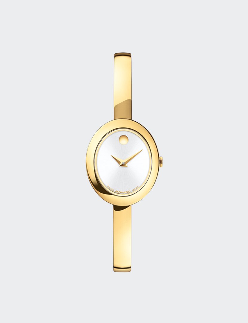 Gold tone Museum Bangle watch with white oval dial.