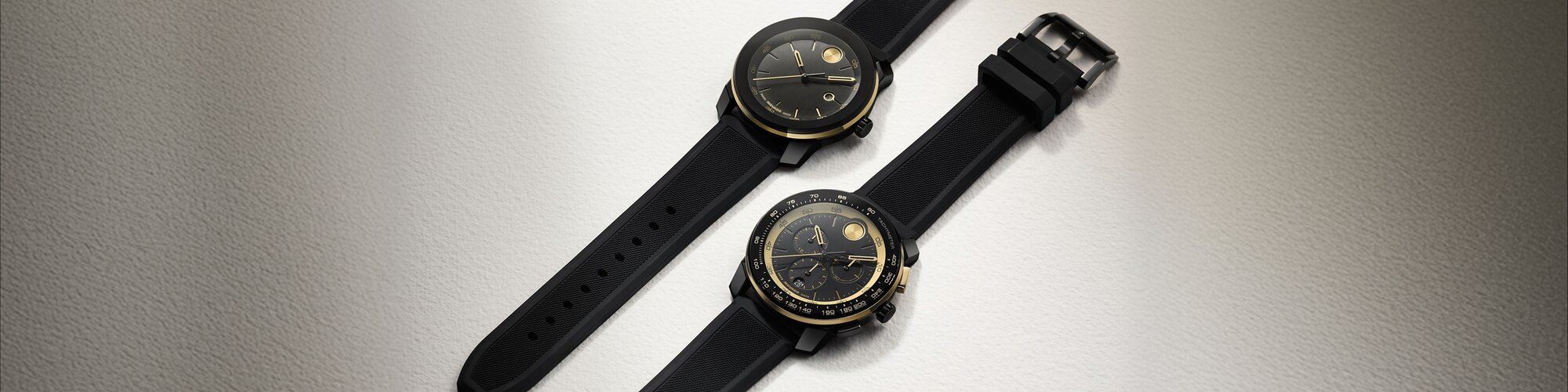 BOLD TR90 watches with black rubber straps and black dials with gold tone accents.