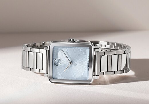 BOLD Evolution 2.0 watch with stainless steel bracelet and square blue dial.