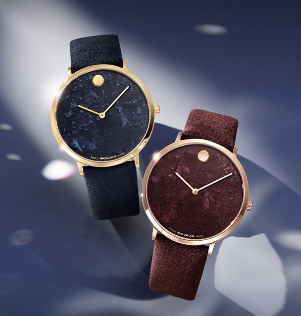 Blue Modern 47 watch next to a red Modern 47 watch. 