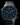Alta Centurion watch in dim lighting with the Swiss Super-LumiNova® accents glowing on the dial. 