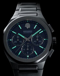 Alta Centurion watch in dim lighting with the Swiss Super-LumiNova® accents glowing on the dial. 