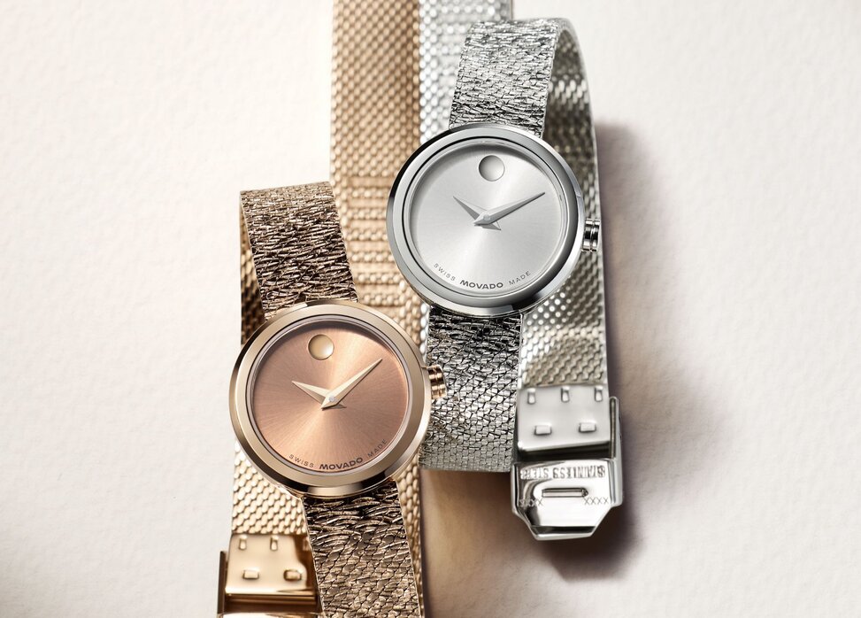 Rose gold tone Museum Velura watch with mesh bracelet next to the stainless steel Museum Velura watch with mesh bracelet.