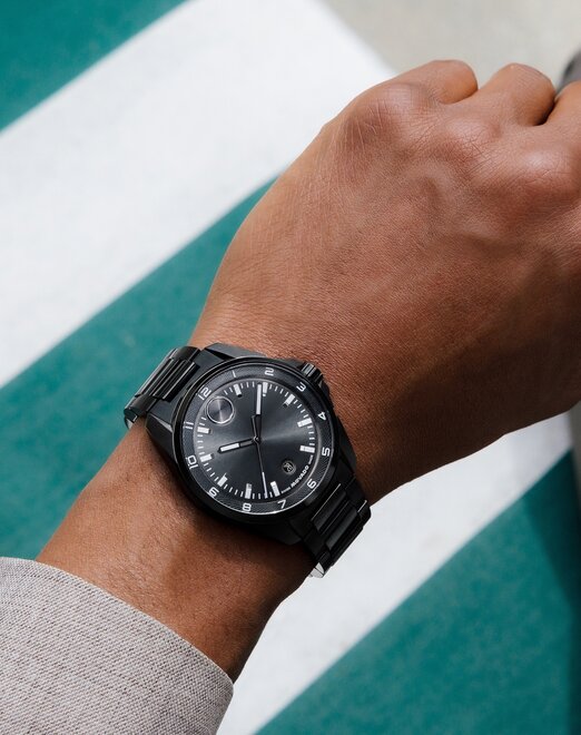Man wearing the grey plated BOLD Verso S bracelet watch.