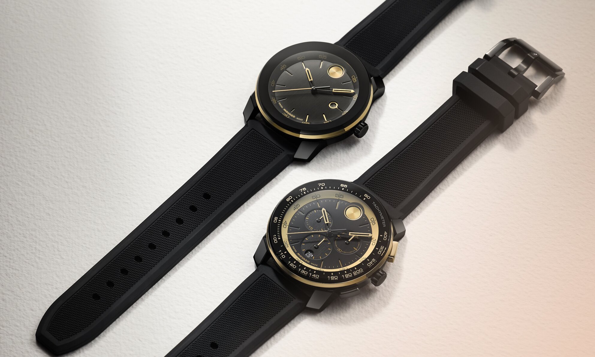 BOLD TR90 watches with black rubber strap and gold tone accents on the dials.