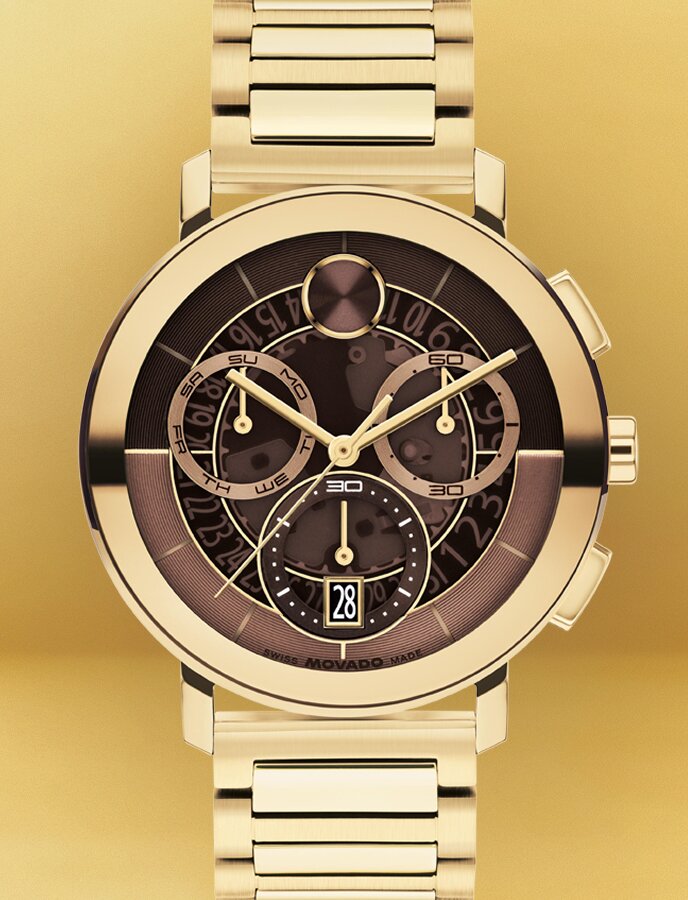 Gold Tone BOLD Evolution 2.0 bracelet watch with brown skeleton dial.