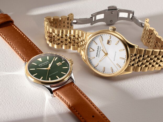 Heritage Calendoplan watch with brown leather strap and green dial next to the Heritage Calendoplan watch with gold tone bracelet and white dial.