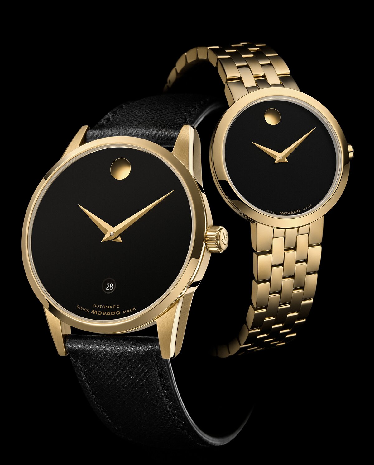 Black Museum Classic Automatic watch with leather strap intertwined with the women's gold tone Museum Classic bracelet watch with black dial.
