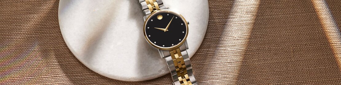 Two Tone museum classic watch with black dial and diamond markers