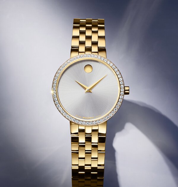 Museum Classic watch with gold tone bracelet and silver dial with lab grown diamond bezel

