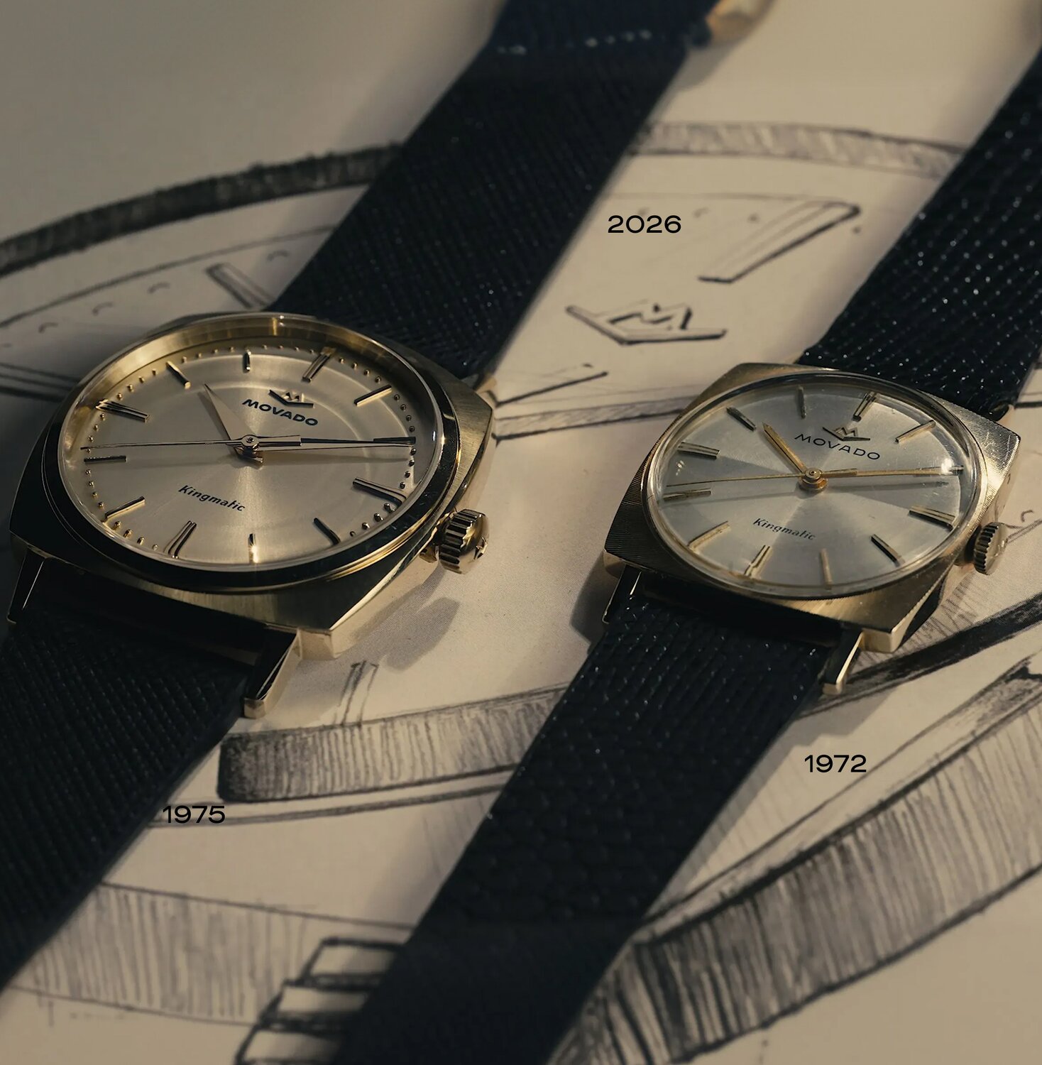 Original Heritage Kingmatic watch with black strap and gold square dial laying next to the new Heritage Kingmatic watch in the same color.