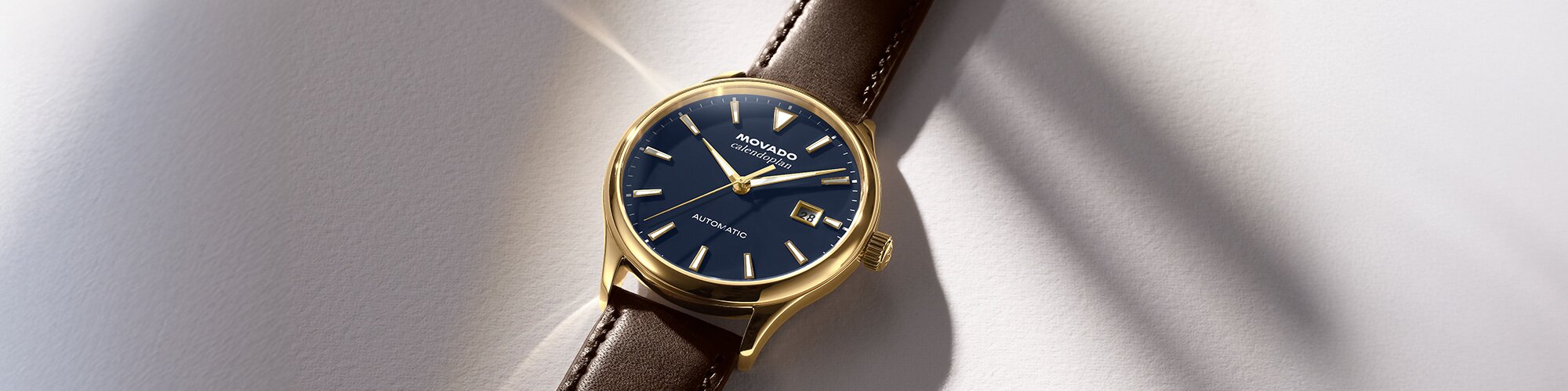 Heritage Calendoplan with brown leather strap and blue dial.