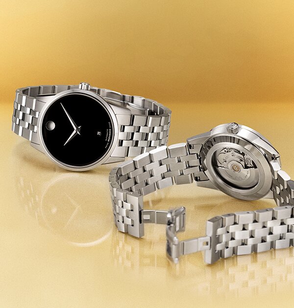 Back of a black PVD watch with exposed caseback that shows the automatic movement