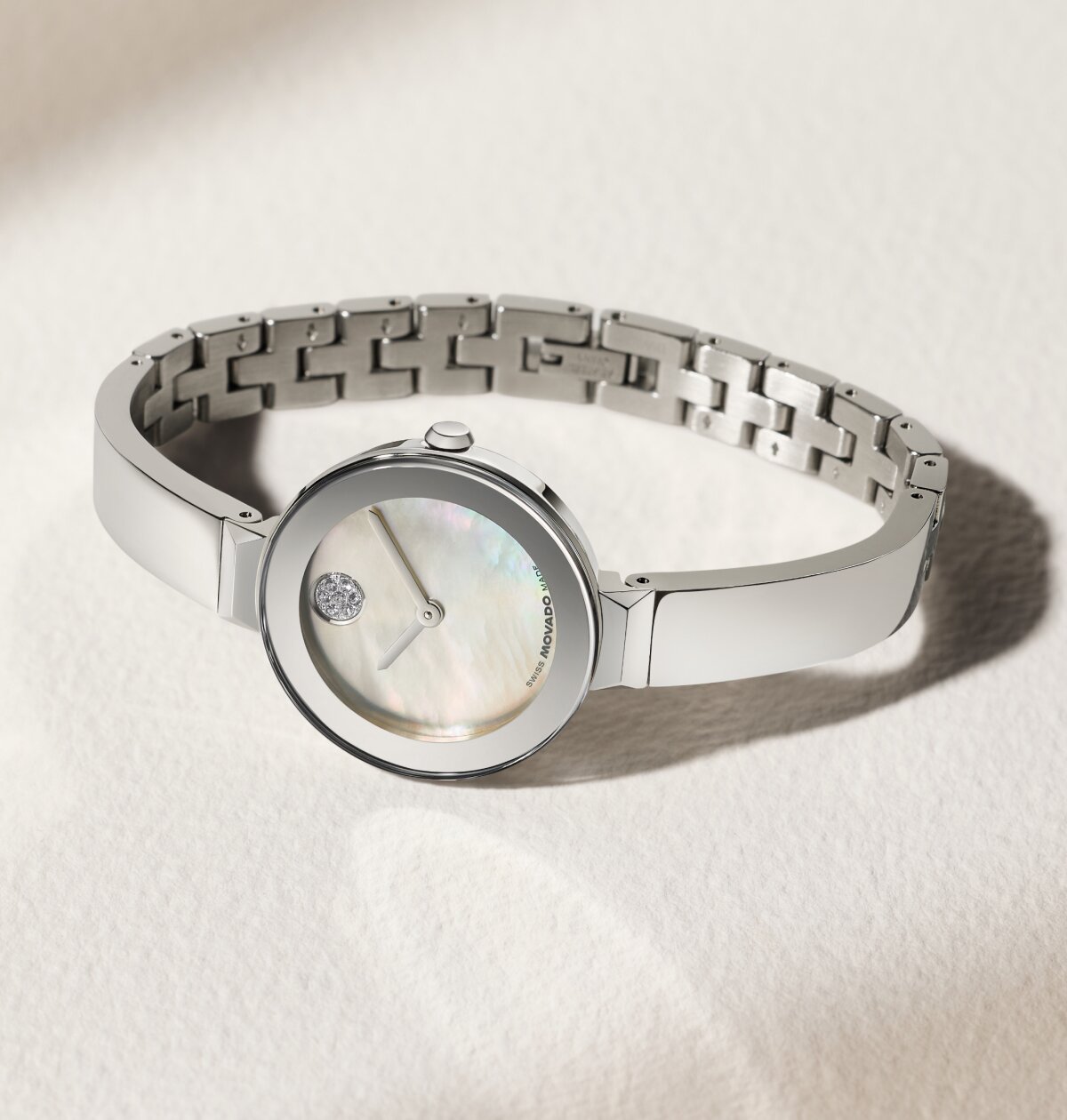 Stainless Steel BOLD Bangle watch with silver mother of pearl dial and crystal dot.