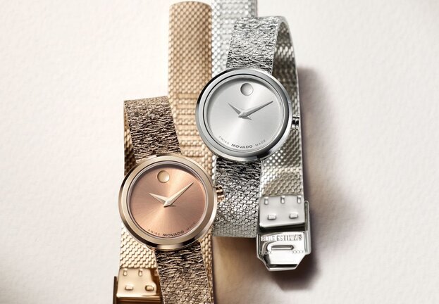 Rose gold tone Museum Velura watch with mesh bracelet next to the stainless steel Museum Velura watch with mesh bracelet.