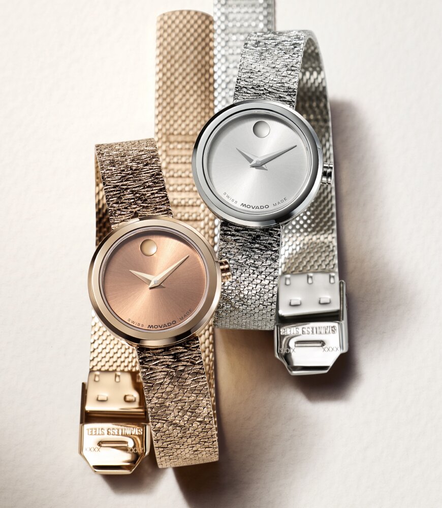Rose gold tone and stainless steel Museum Velura watches with mesh bracelets.