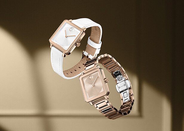 BOLD Evolution 2.0 with white leather strap and white dial next to a rose gold tone BOLD Evolution 2.0