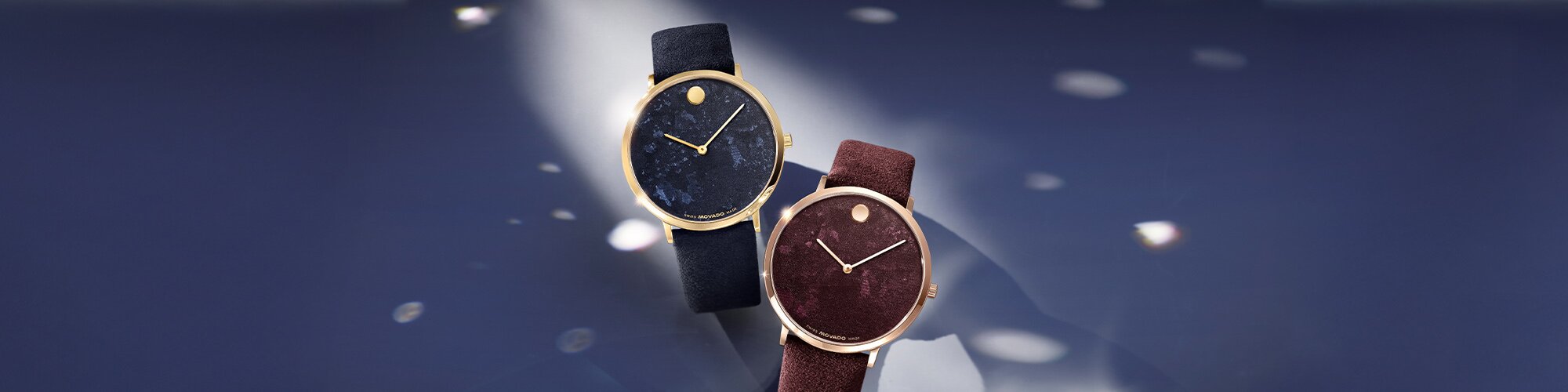 Blue Modern 47 watch next to a red Modern 47 watch. 