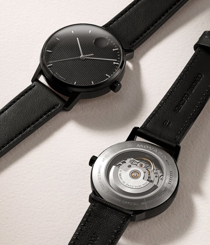 Front and back of the Face Automatic watch with leather bracelet and exposed case back.