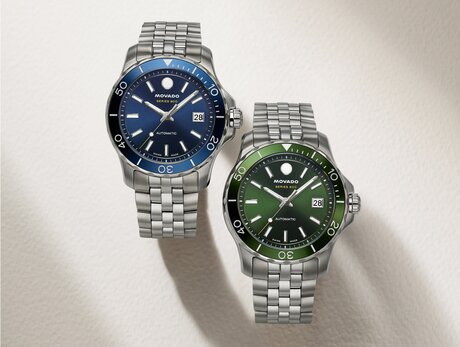 Two Series 800 bracelet watches with blue dial and green dial.