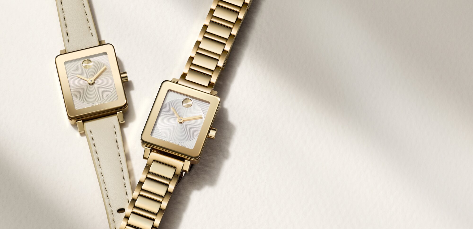 BOLD Evolution 2.0 Mini watch with tan leather strap and champagne dial and gold tone bracelet with white square dial. 