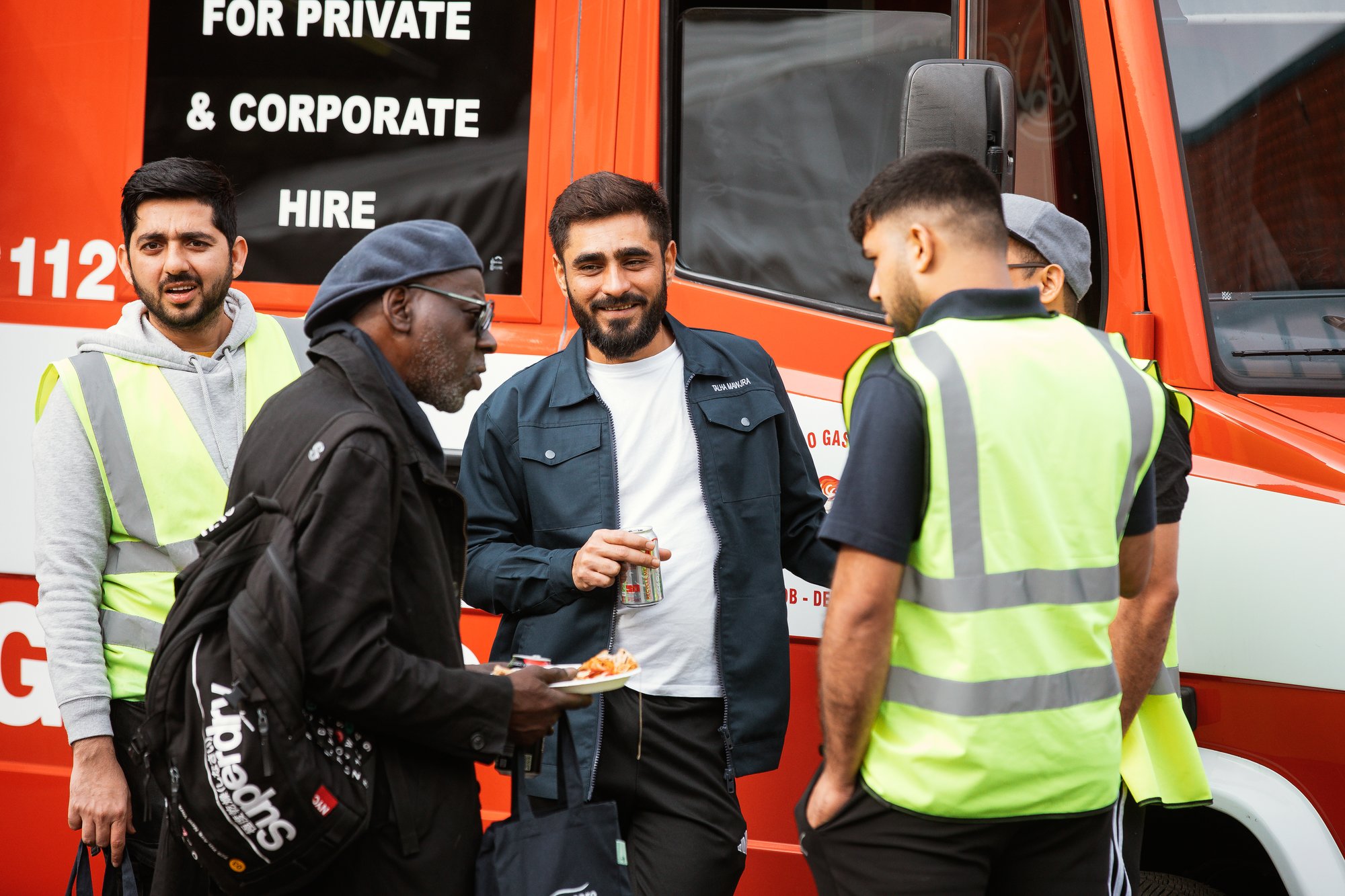 Employees talking to each other whilst enjoying their lunch