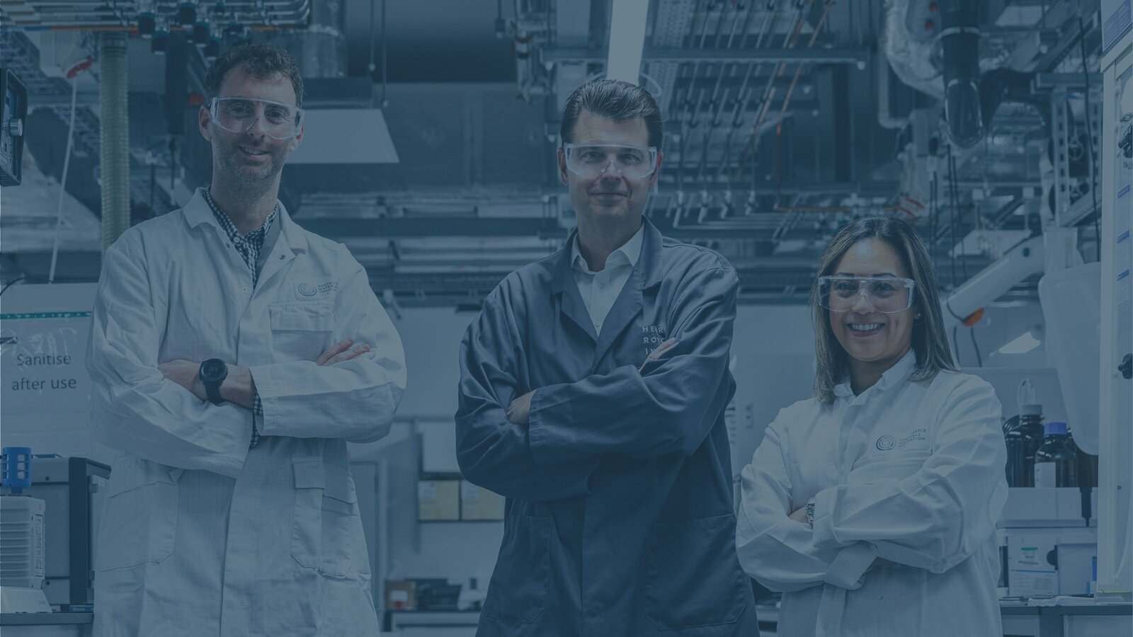 Alex Hodges, Dr Tom McDonald, and Dr Rosa Cuellar Franca in the lab at the Henry Royce Institute