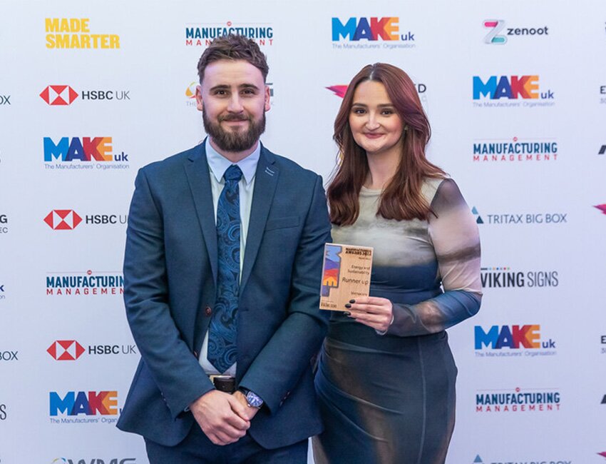Ben Winterbottom, Group ESG & Sustainability Manager, and Lydia Heap, Global Marketing Communications Executive accepting the award.