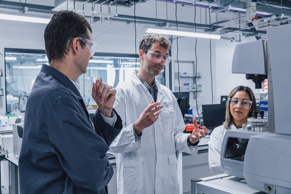 Dr Tom McDonald and Dr Rosa Culler Franca explaining the Henry Royce Institute's machinery to Alex Hodges