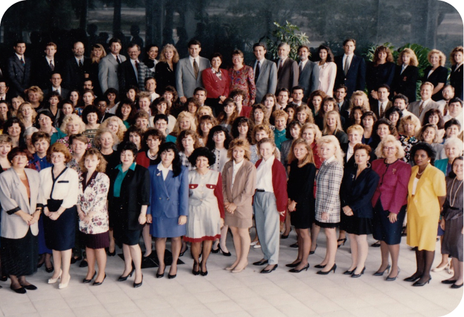 Cross Country color photo of large group of people facing forward.