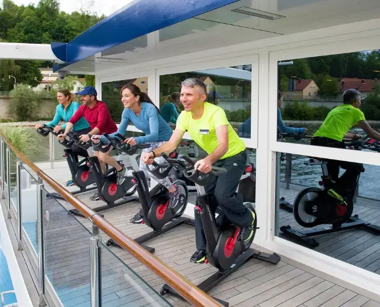 Guests cycling workout on AmaMagna