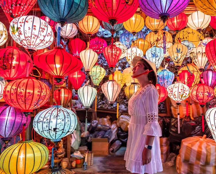 Girl looking at lanterns in Central Vietnam