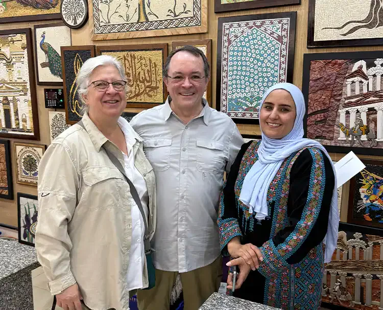 Carol and her husband at workshop