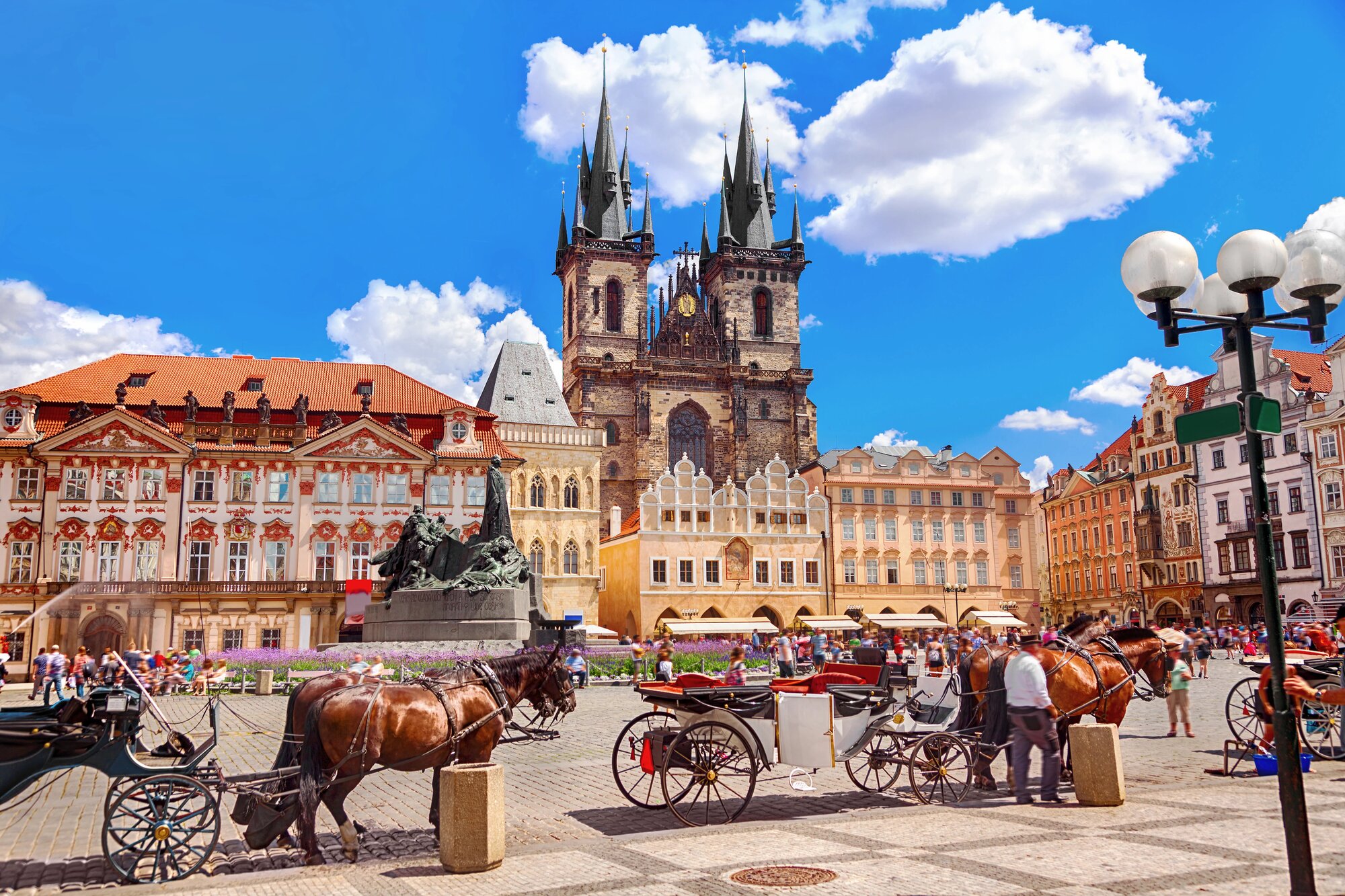 Carriages in front of old town square 