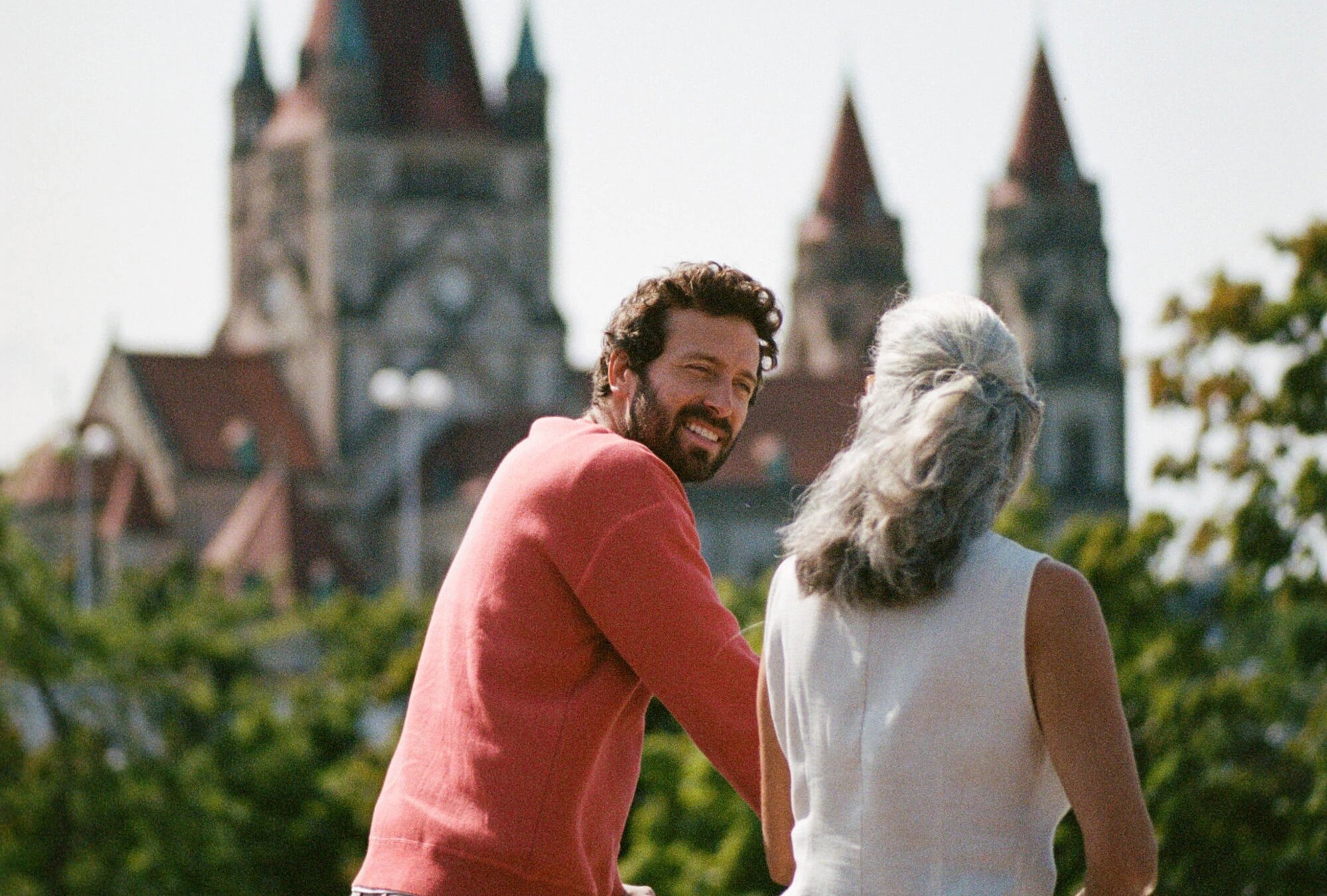 Couple looking at a castle from top deck