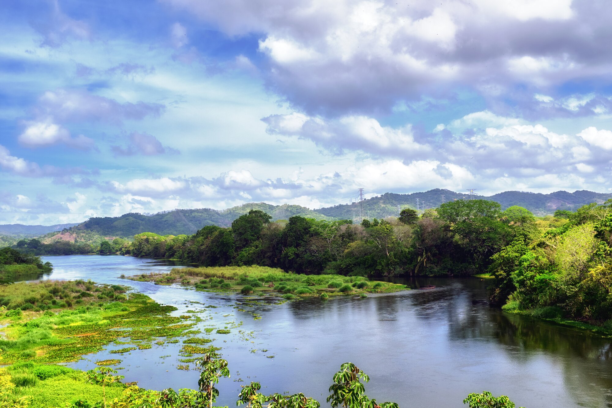 A beautiful overview of Chagres National Park, Panama. Rio Chagres river cuts deep inside the tropical forests under amazing cloudy sky. The park contains tropical rain forests and a set of rivers.