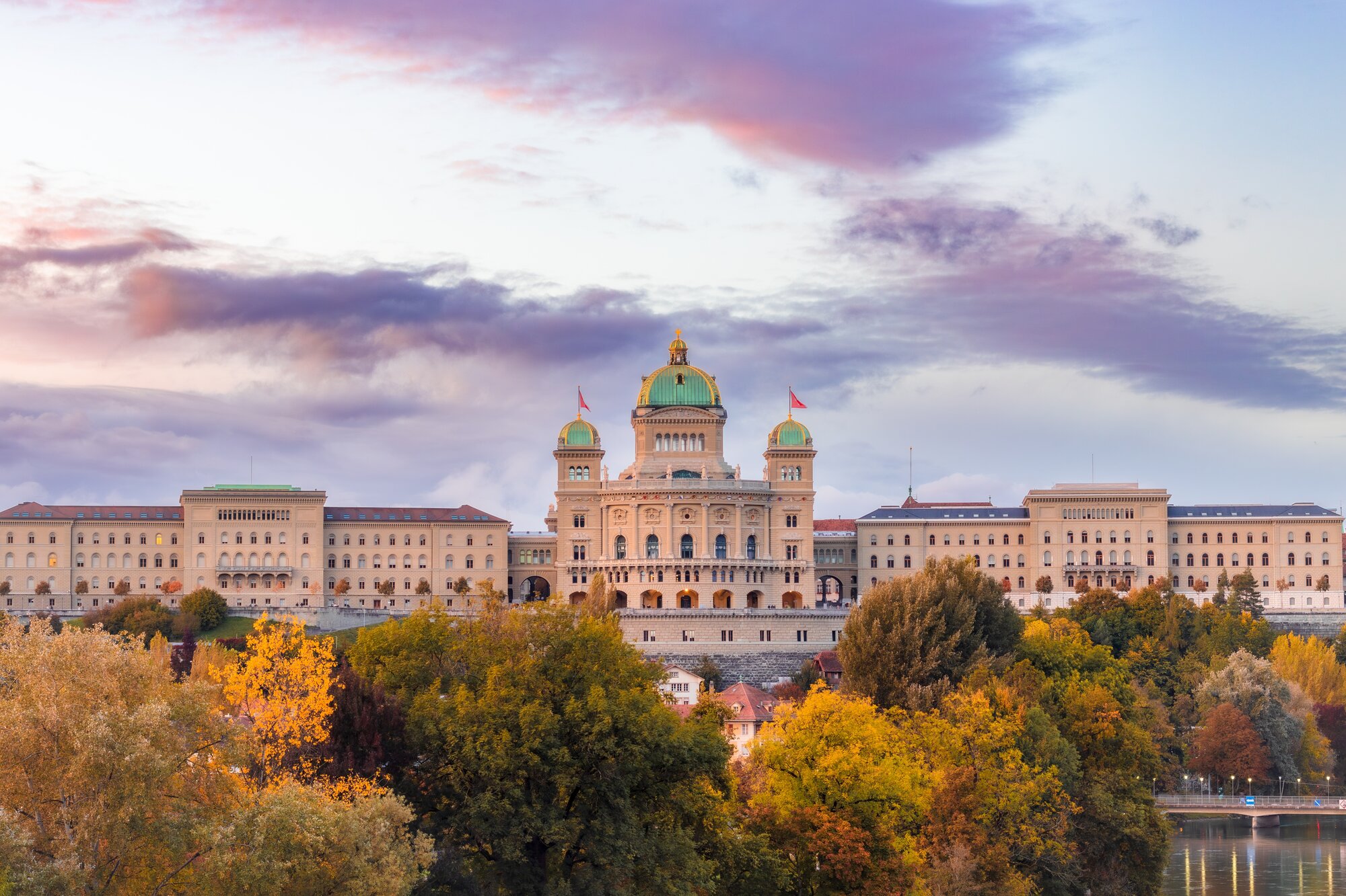 Bern, Switzerland with the Federal Palace at blue hour with colorful sky in autumn or fall.