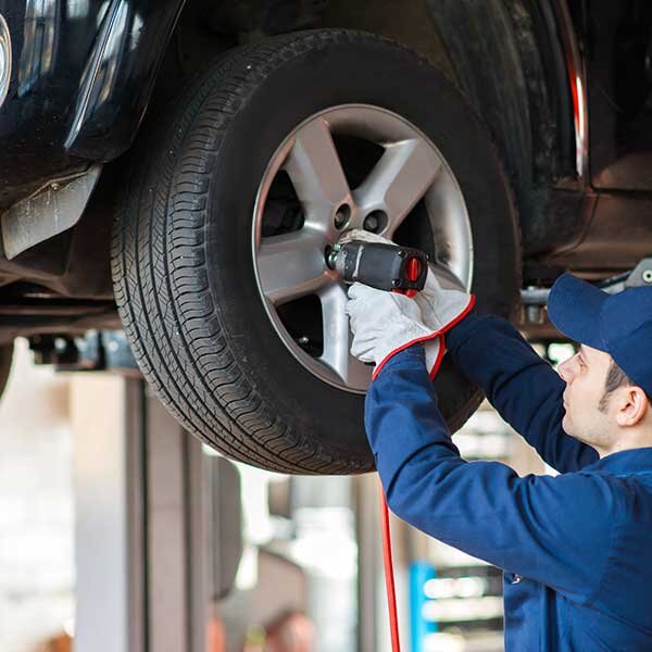 A tire being changed in the shop.