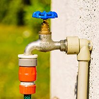 An outdoor valve installed on a home.