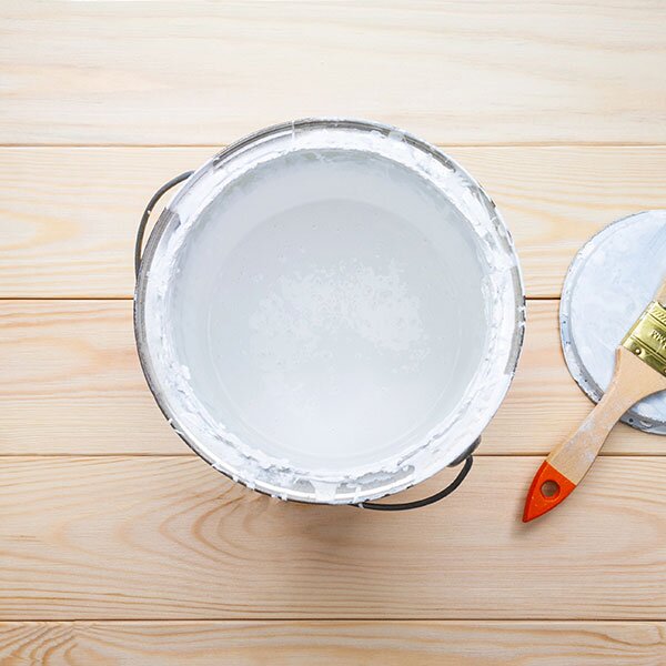 A white paint can, opened. 