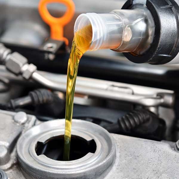 Fluids being topped off in the car.