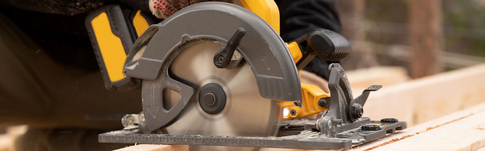 A cordless circular sawing lumber.