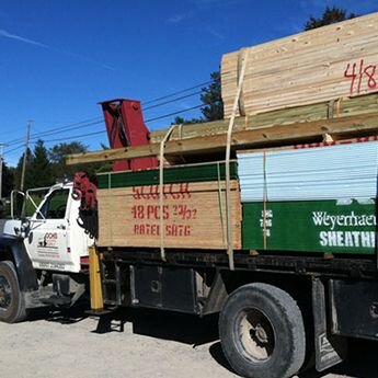 Ochs delivery truck loaded with lumber