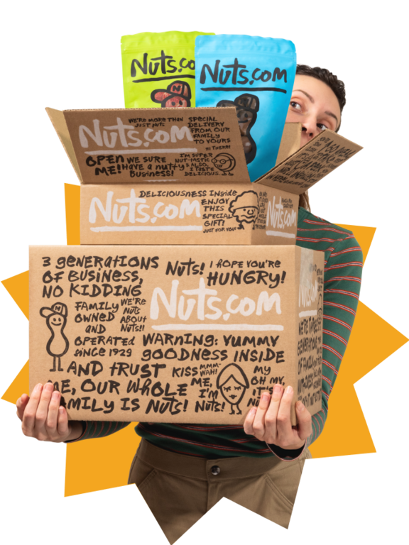 Image of Woman holding snack boxes