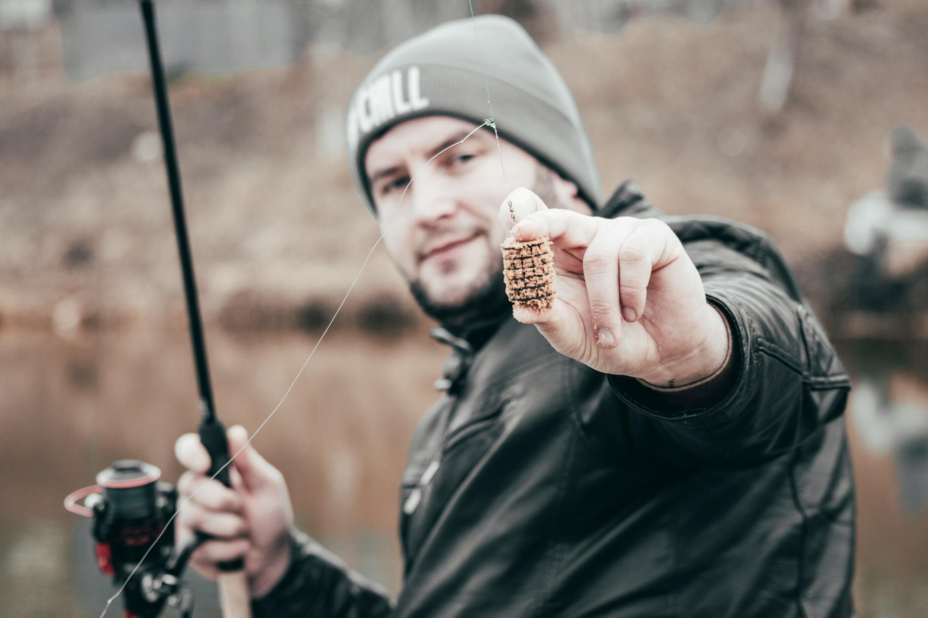 guy showing his fishing bait