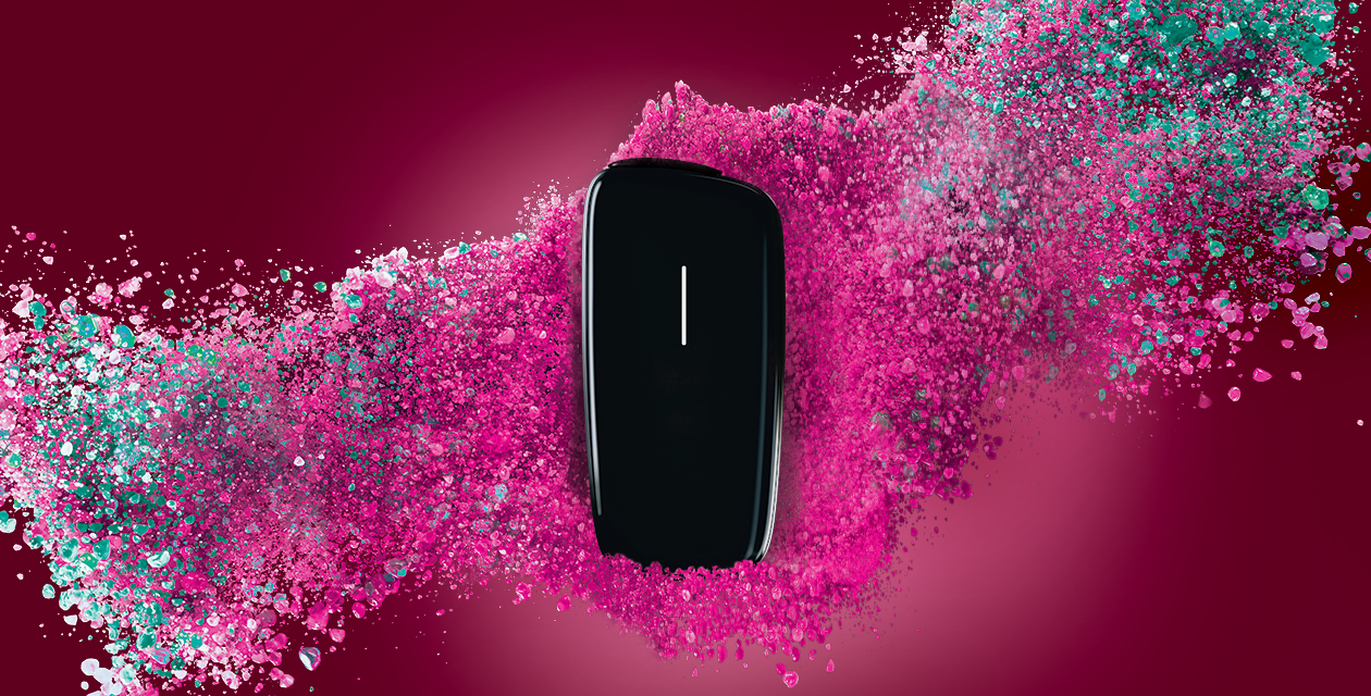 Ploom device with magenta particles and a visual effect representing grape flavor