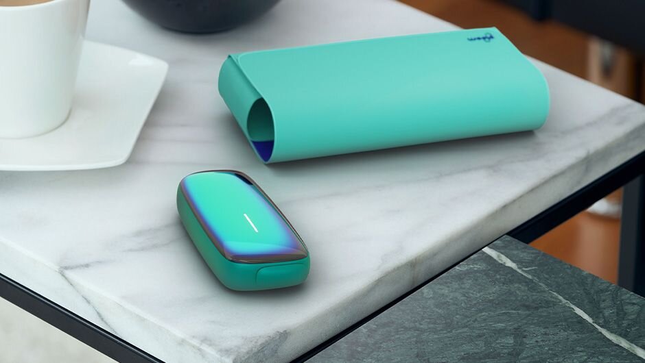 Refreshing home relaxation with the limited-edition Aqua Halo Ploom device | A modern tobacco alternative with coffee and cookies