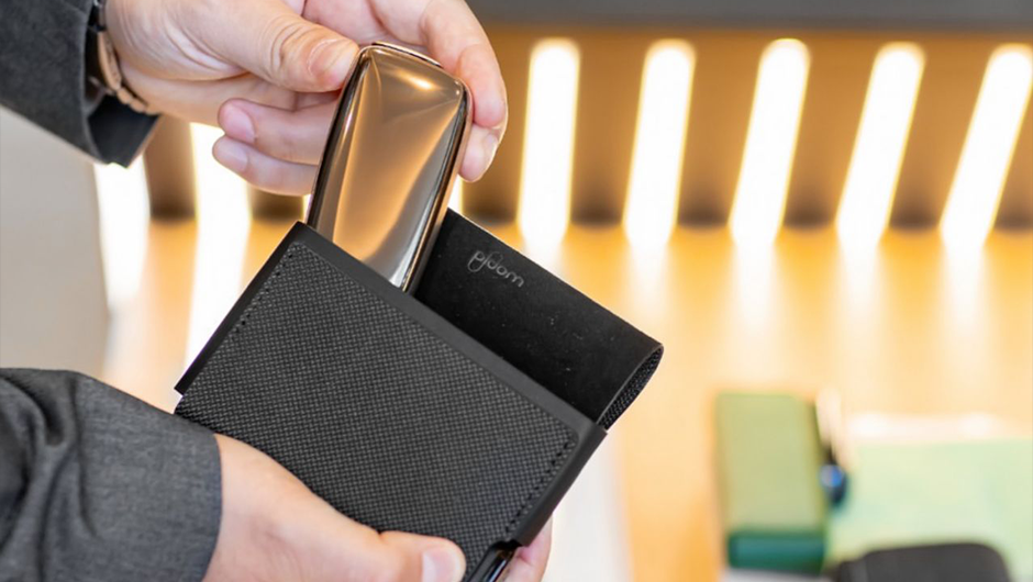Ploom X Advanced in a black case with a glossy metal Ploom device placed inside