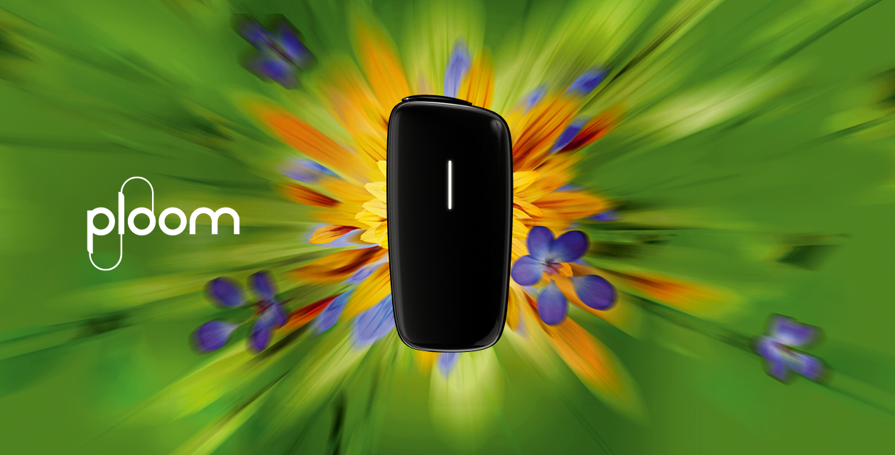 Ploom cihazı yaşıl fon və bahar çiçəkləri fonunda. Bahar Kampaniyası vizualı